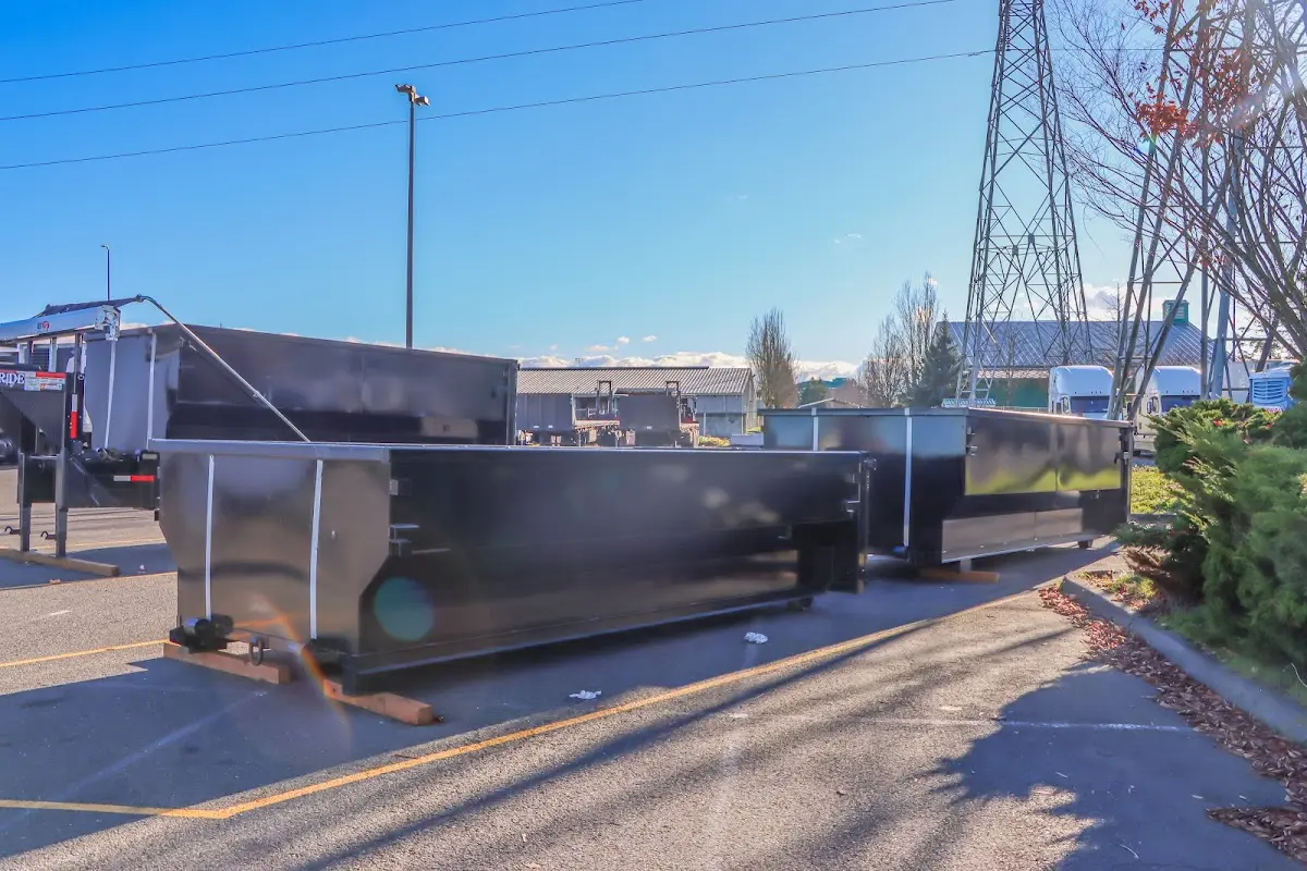 Roll-off dumpster ready for waste disposal at job site for 2 Yard Dumpster Rental in Edgemere